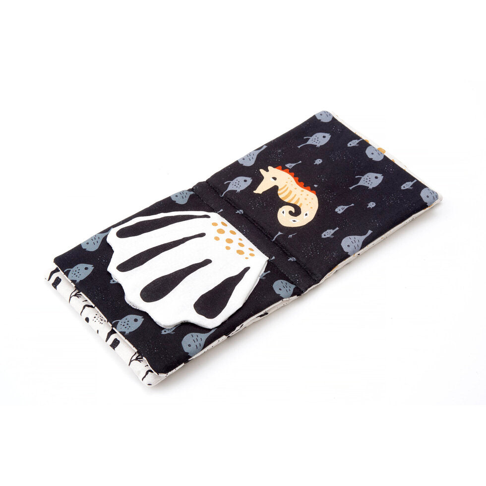 Wee Gallery- Soft Cloth Book Orgnaic Cotton PeekABoo Ocean- Baby at the bank