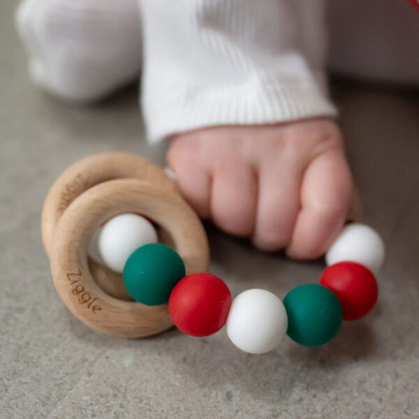 Ziggle- Christmas Silicone and Wood Teether-Baby at the bank