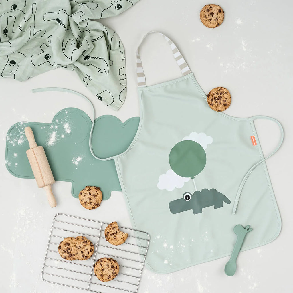 Done By Deer- Waterproof Kids Apron Happy Clouds Green- Baby at the bank