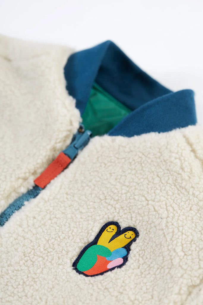 Frugi- Robin Reversible Jacket Teal/Moon- Baby at the bank