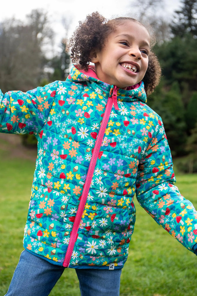 Frugi- Reversible Toasty Trail Jacket Wild Woods Tulip- Baby at the bank