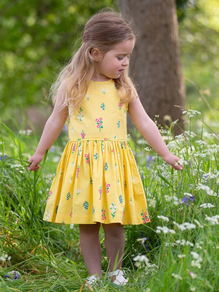 Kite- Wilds and Weeds Dress- Baby at the bank