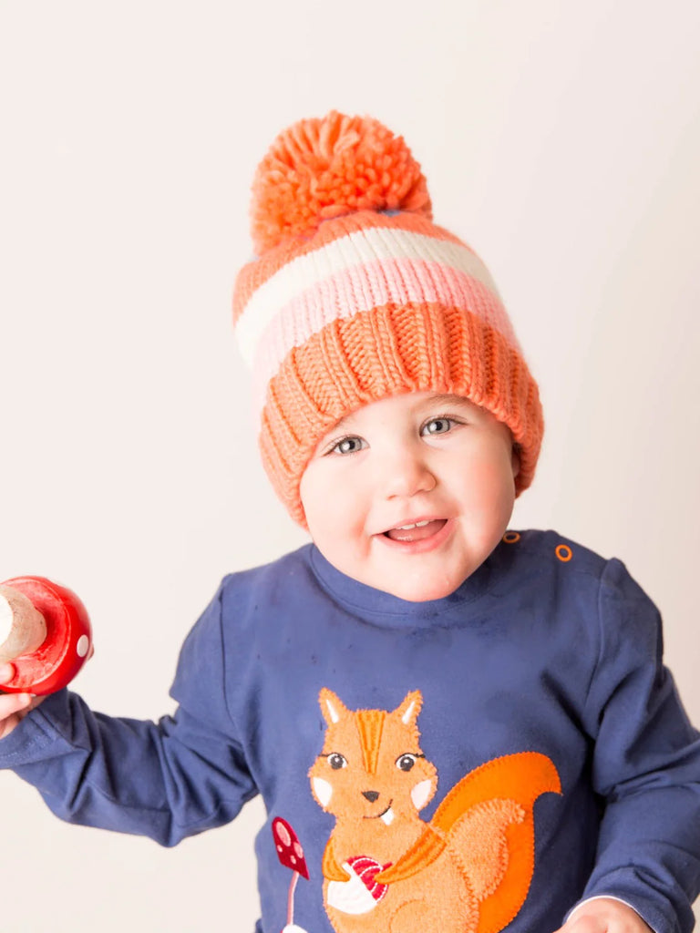 Blade and Rose- Coral and Cream Striped Bobble Hat- Baby at the bank