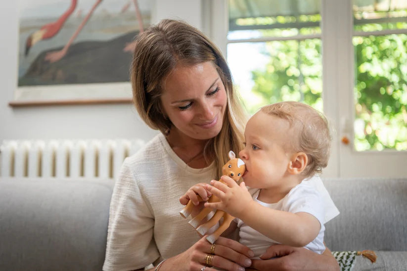 Sophie la Girafe- Fanfan the Fawn Natural Rubber Teether Toy- Baby at the bank